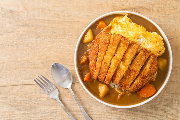 Curry rice with fried pork cutlet and creamy omelet