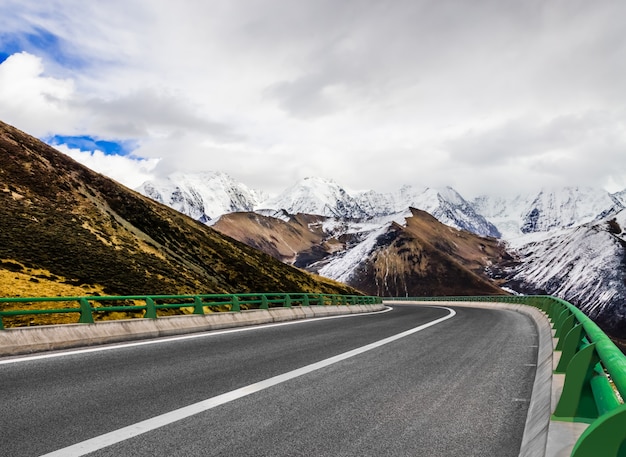 curved  highway and blue sky