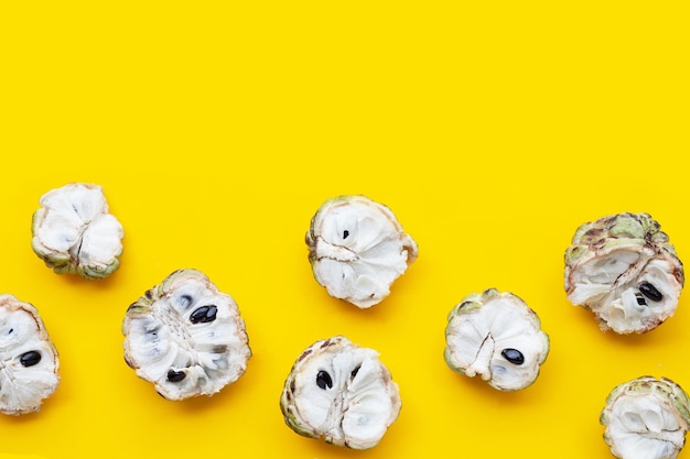 Custard apple on yellow background