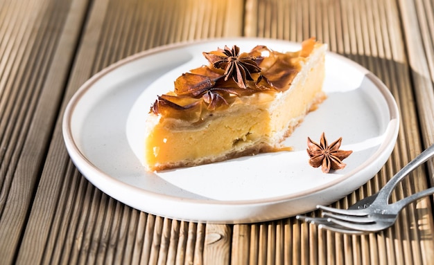 Custard of Galaktoboureko or bougatsa Greek traditional dessert baked in a pan with syrup its called Thessaloniki pie Handmade phyllo stuffed with sweet semolina cream