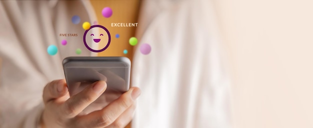 Customer Experiences Concept Happy Client Using Smartphone to Reading Review Rating for Online Satisfaction Surveys Positive Feedback on Mobile Phone