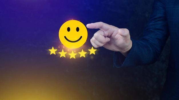 Customer services best excellent business rating experience Positive Review and Feedback Satisfaction survey concept Hand of a businessman show happy smile face with five star