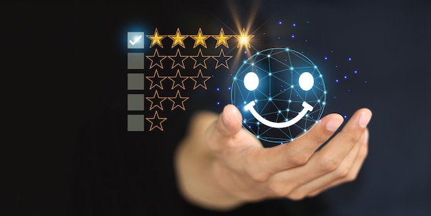 Customer uses the hand of the satisfied icon to evaluate the score after the trade or use the service five star rating with copy space customer satisfaction concept