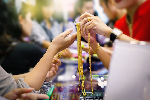 Customers are buying gold jewelry in the gold shop