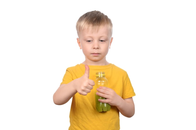 cut boy drinking fresh fruit juice