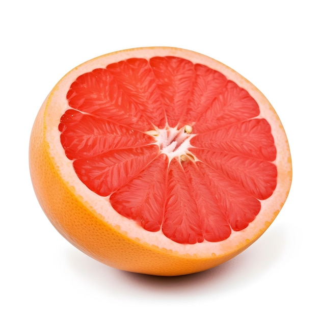 A cut in half of a grapefruit with a pink center.