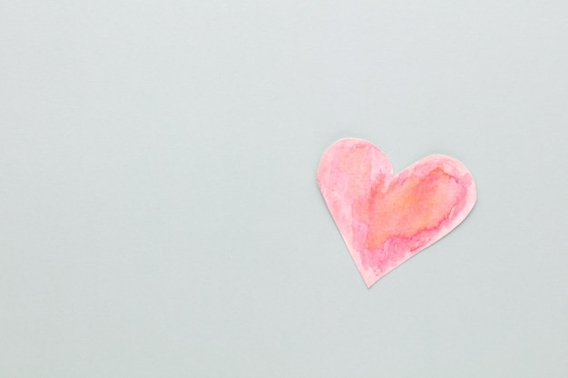 Cut the heart shaped paper, put on a pastel background. Valentine's Day Concepts