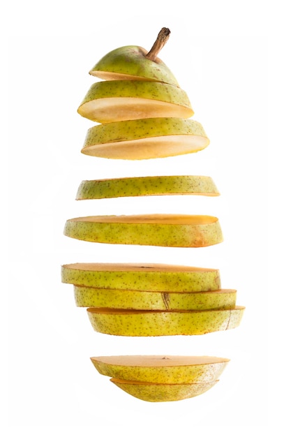 Cut into slices of ripe pear on a white background