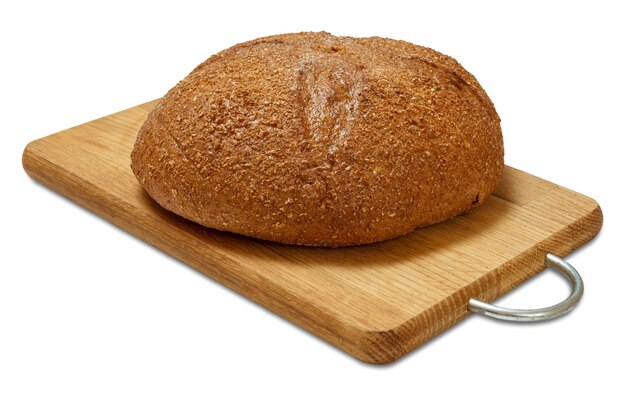 Cut loaf of rye bread on wooden cutting board