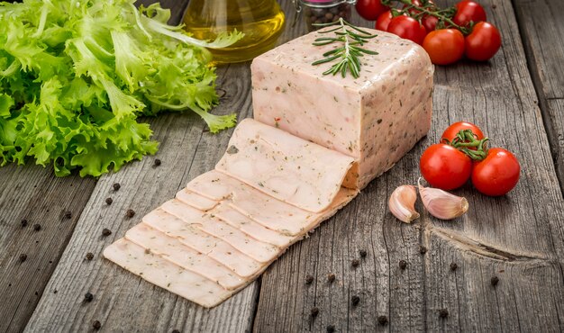 Cut meat on a wooden surface