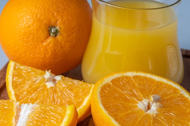 Cut orange closeup for juice macro photo