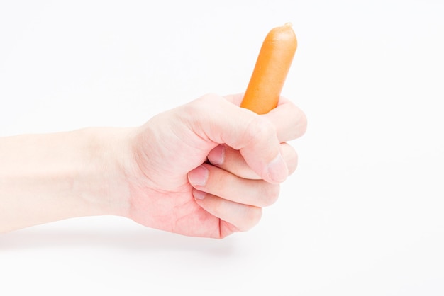 Cut Out Hand Holding Sausages on White Background