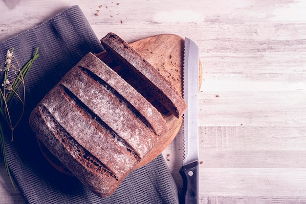 Cut rye bread Gray background with copy space