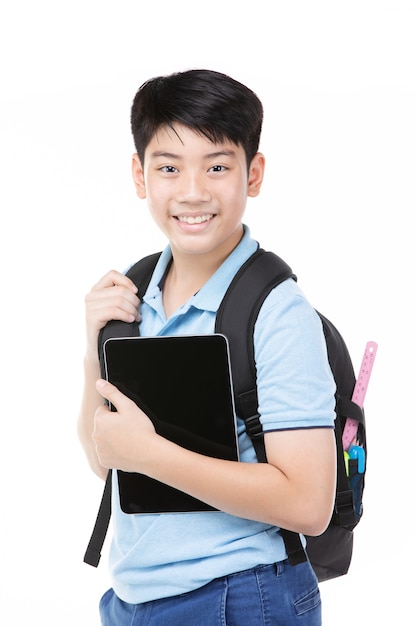 Cute asian child with school backpack and tablet