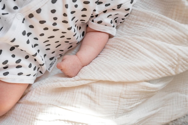 Cute baby cam on a white blanket