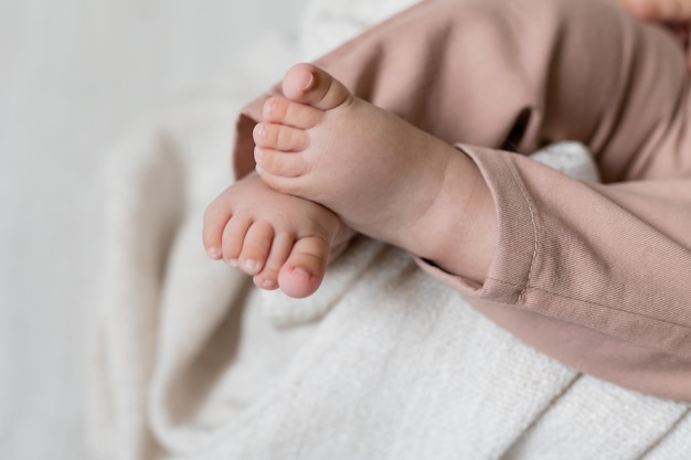 cute baby's feet on blanket card banner space for text health