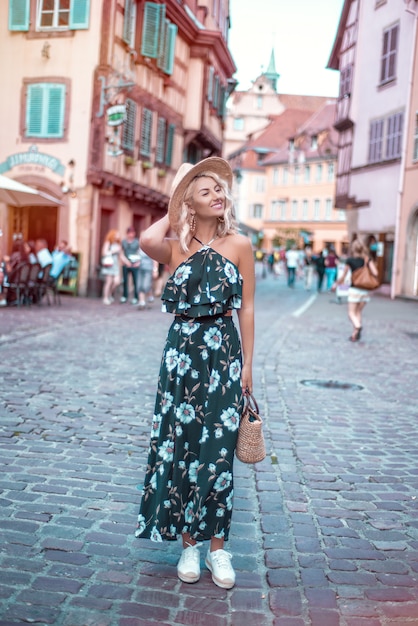 Cute blonde woman exploring European City, Colmar, France