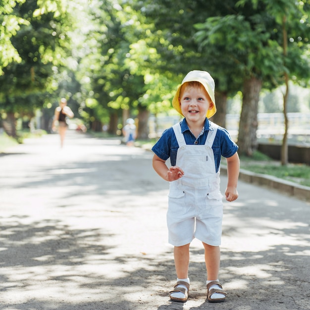 Cute boy posing for photo outdoors. Ukraine. Europe