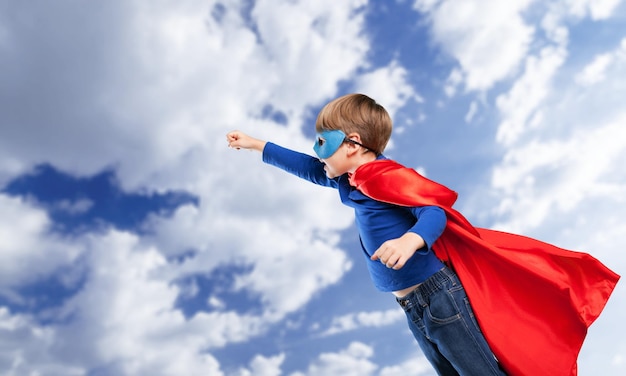 Cute Child boy in superhero costume