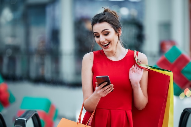 Cute girl posing at shopping mall