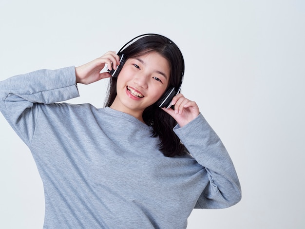 Cute girl while listening to music