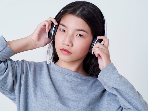 Cute girl while listening to music