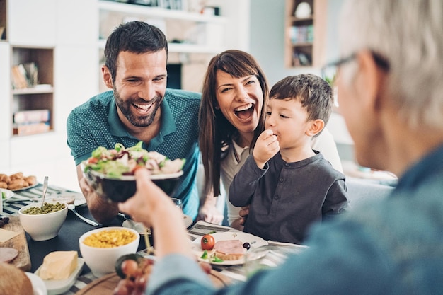 Cute Happy family with their sons at home