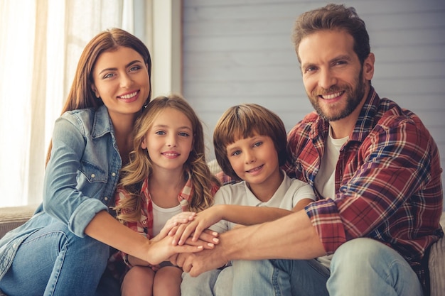 Cute Happy family with their sons at home