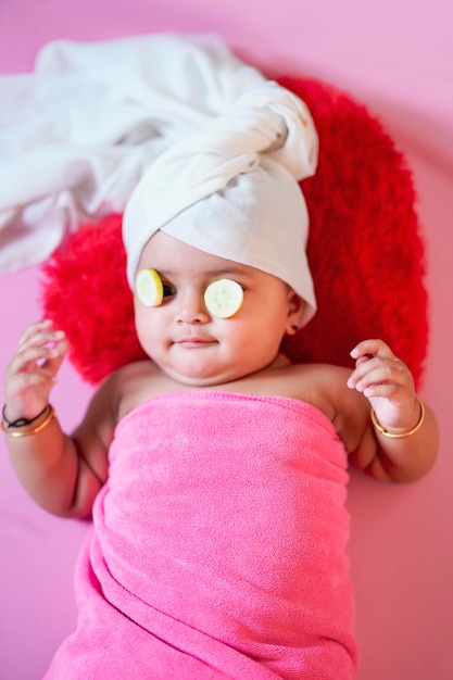 Cute indian little girl child doing make up