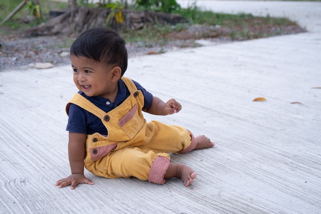 Cute little baby boy play at the park