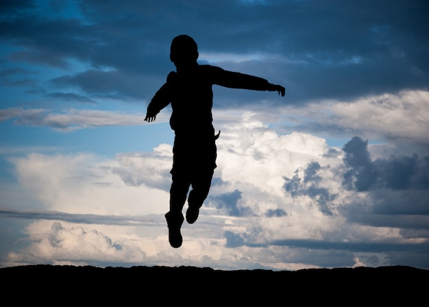 Cute little boy jump