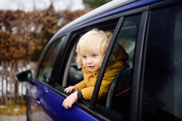 Cute little boy ready for a roadtrip or travel