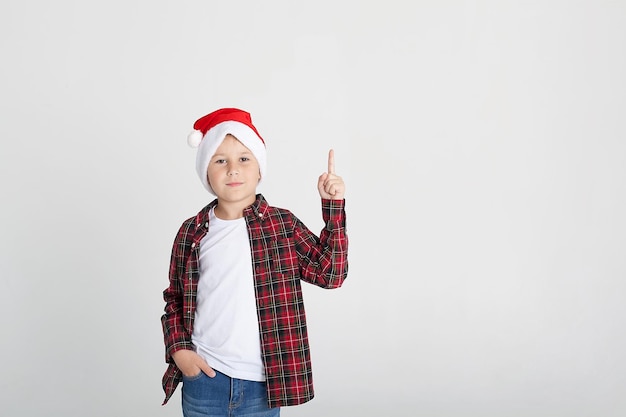 Cute little boy in the santa claus hat