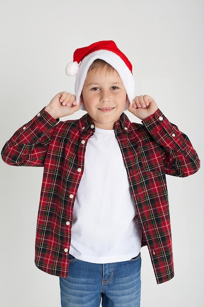 Cute little boy in the santa claus hat