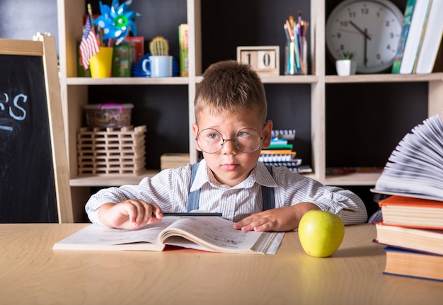 Cute little boy wearing a school uniform