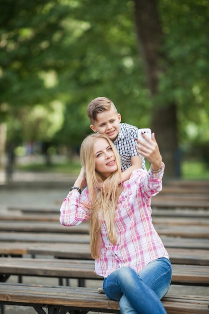 Cute little children playing frisbee outdoors