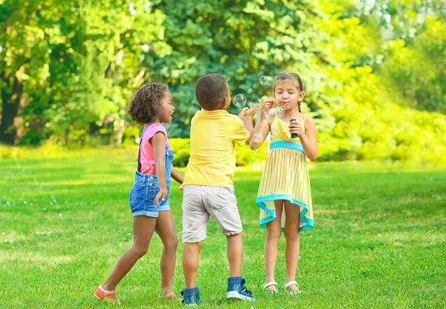 Cute little children playing outdoors