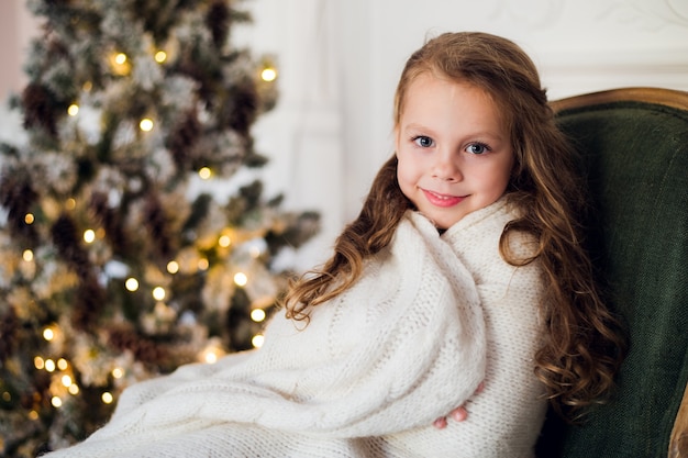 Cute little girl on Christmas at home