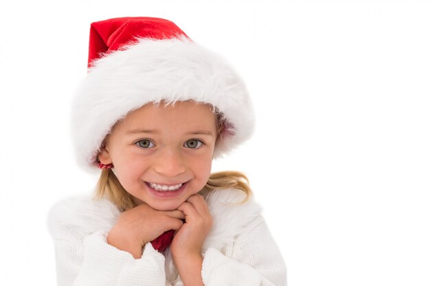 Cute little girl wearing santa hat 