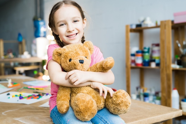 Cute Little Girl with Teddy Bear