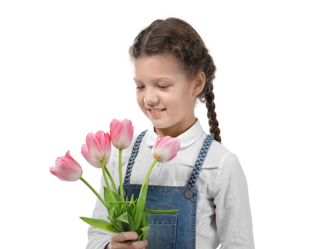 Cute little girl with tulip bouquet for Mother's day on white background