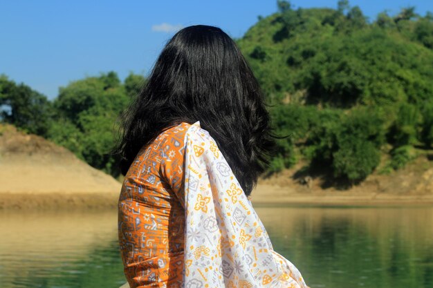 Cute model girl on the natural background.