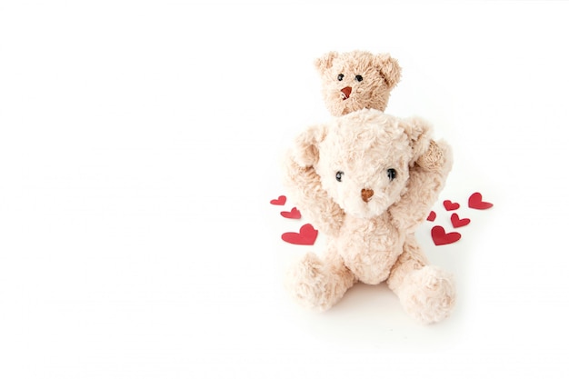 Cute teddy bear so happy with many hearts in valentine.