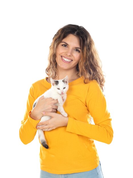 Cute young woman holding her cat isolated on a white