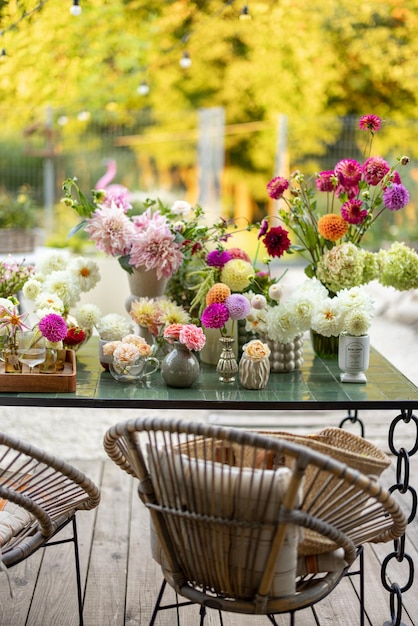 Cuted flowers on table outdoors