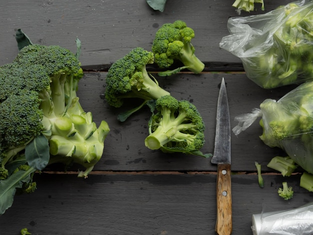 Cuts broccoli for freezing in bags harvest storage