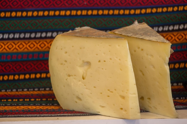 Cuts of kashkaval or kasseri cheese for sale