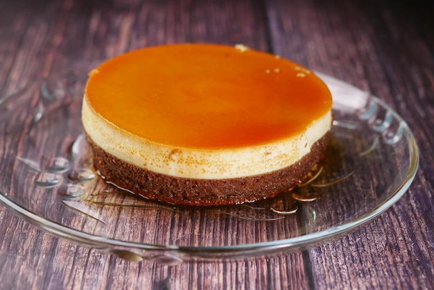 Cutting caramel custard pudding with knife