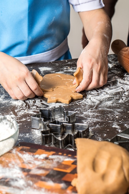 Cutting dough on different shapes. gingerbread