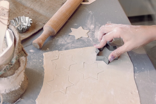 Cutting the dough with a baking tin